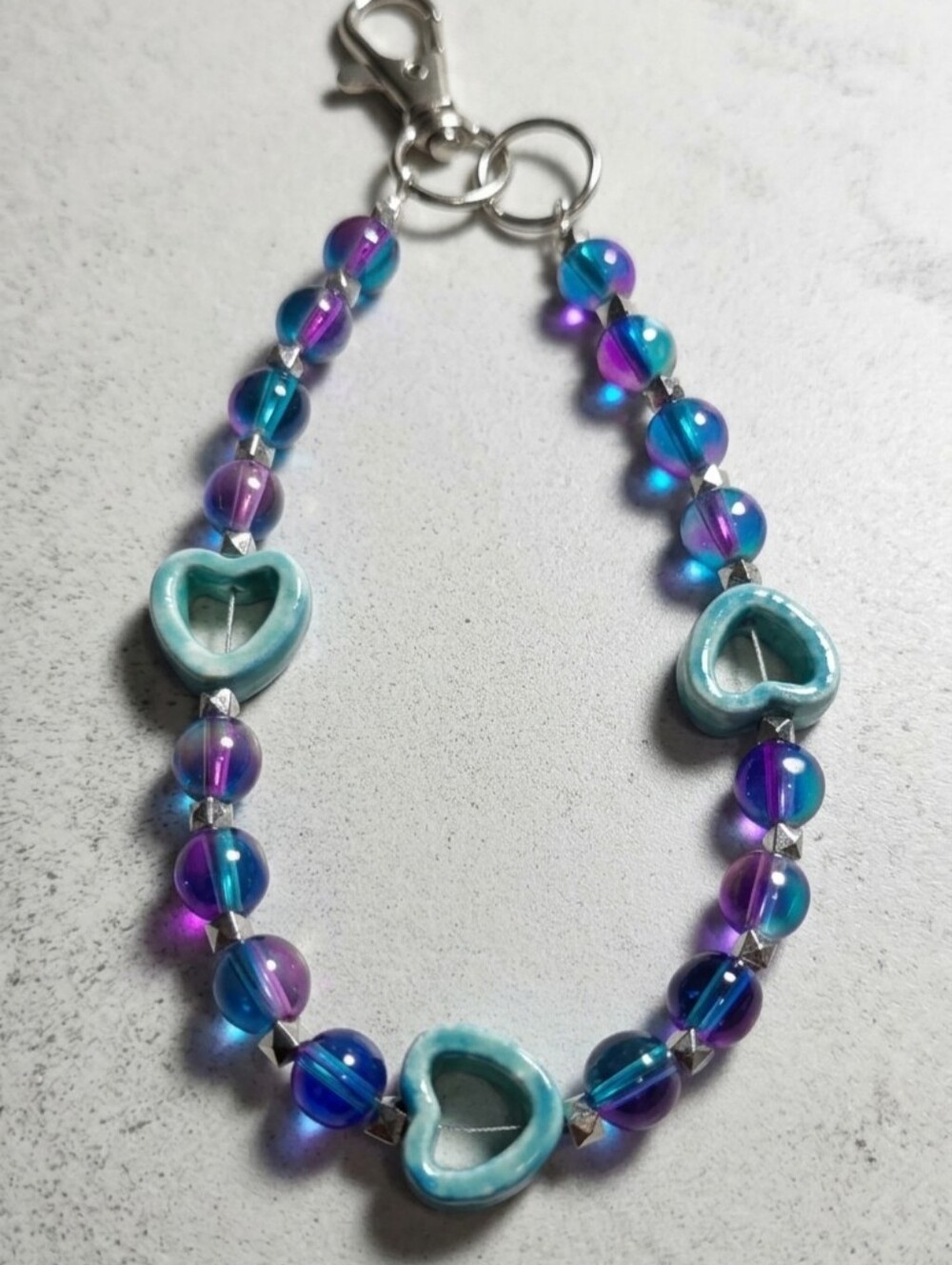 Handcrafted Iridescent Blue & Purple Glass Bead Heart Phone Wristlet